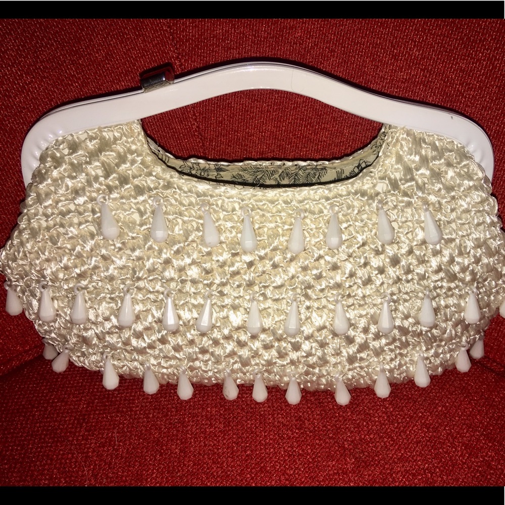 Woven bag w/ gem drops. Fully lined toile fabric.